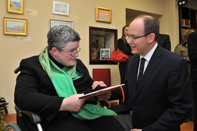 Prince Albert II, son of the late Princess Grace, with artist Mary Collins